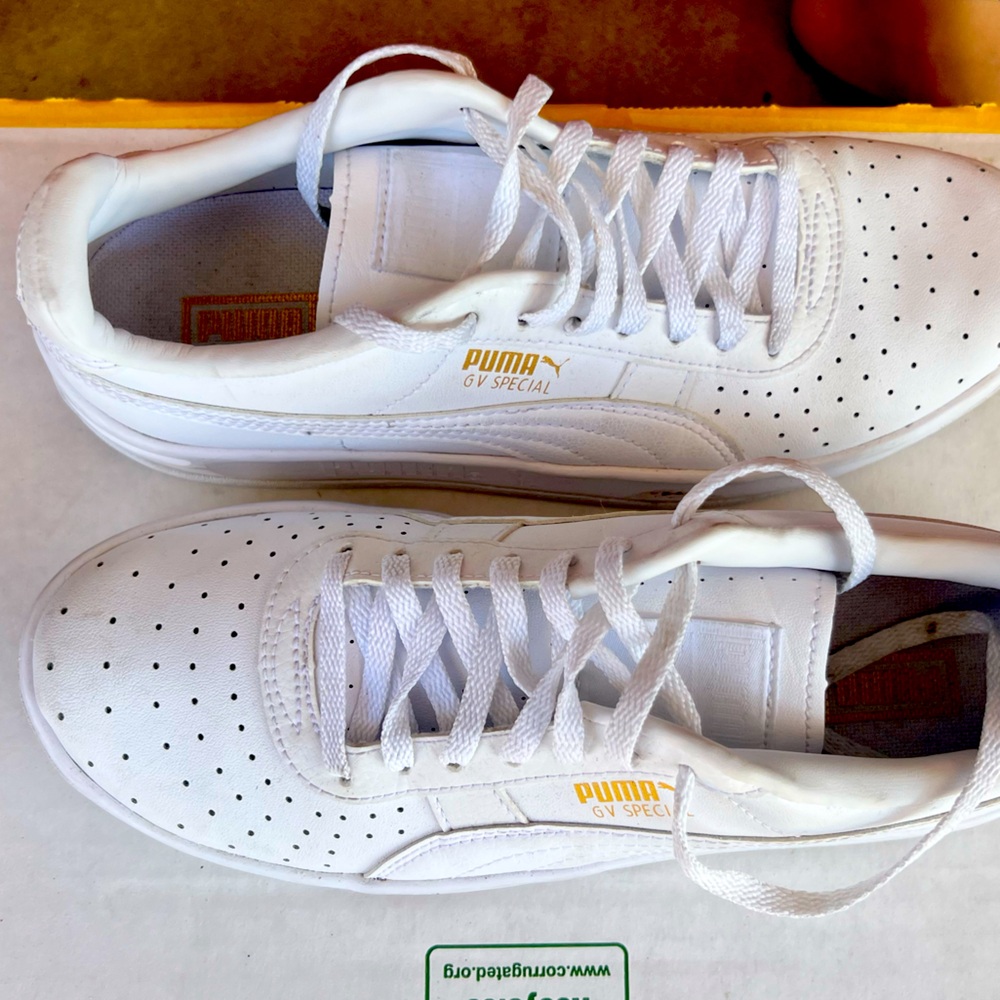 US Woman size 5. White Pumas